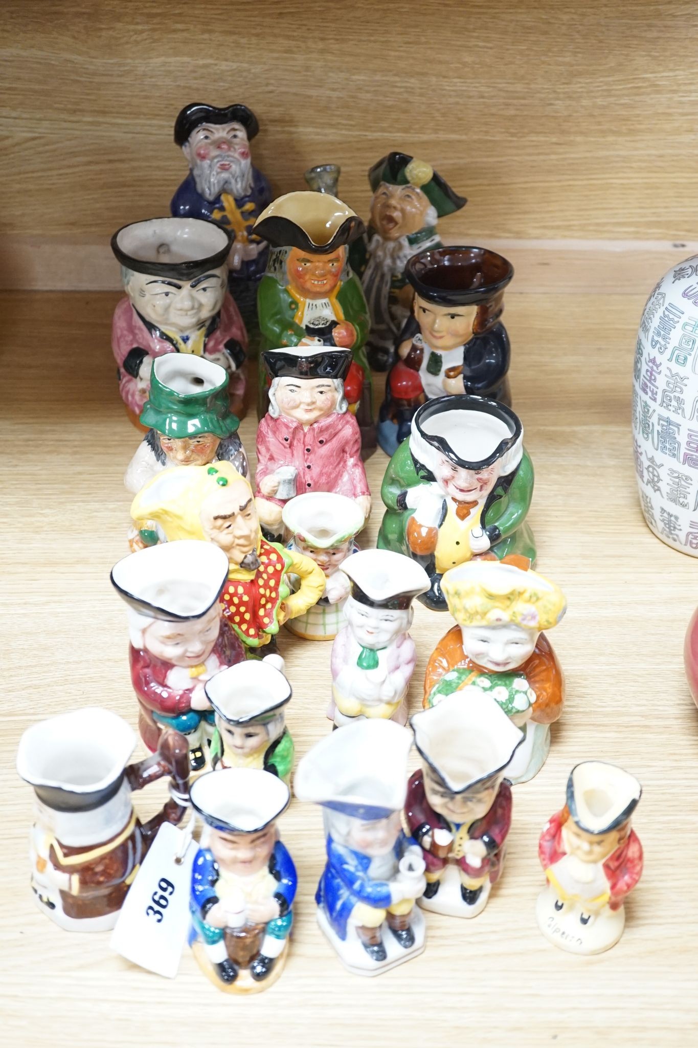 Nineteen various Toby pottery jugs, tallest 18 cm